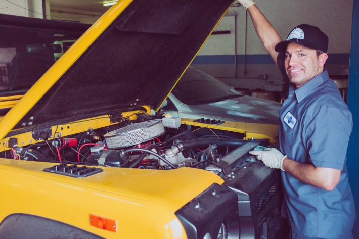 Mechanic and yellow car